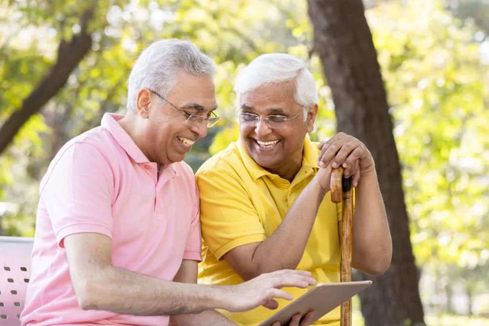 two older men smiling